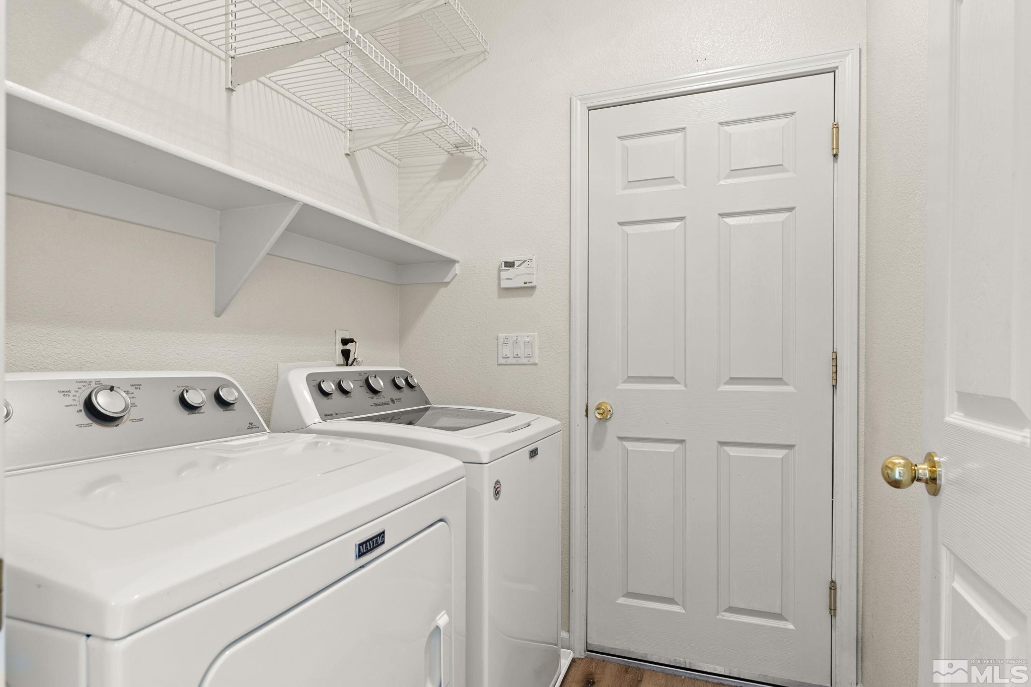 1436 Gaucho Lane Reno, NV 89521 - Photo 18 of 40 a utility room with dryer and washer