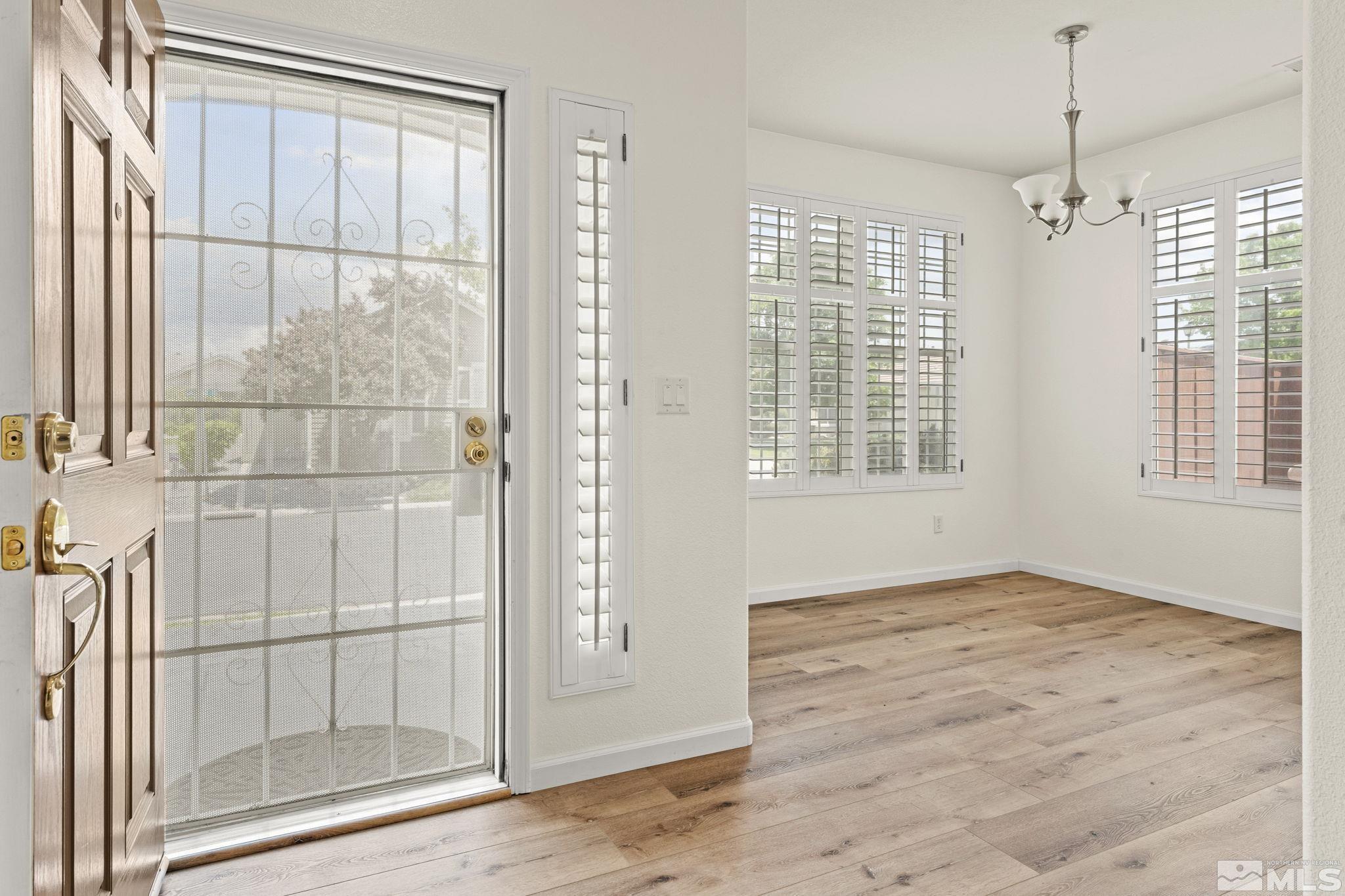 1436 Gaucho Lane Reno, NV 89521 - Photo 20 of 40 a view of an empty room with a window