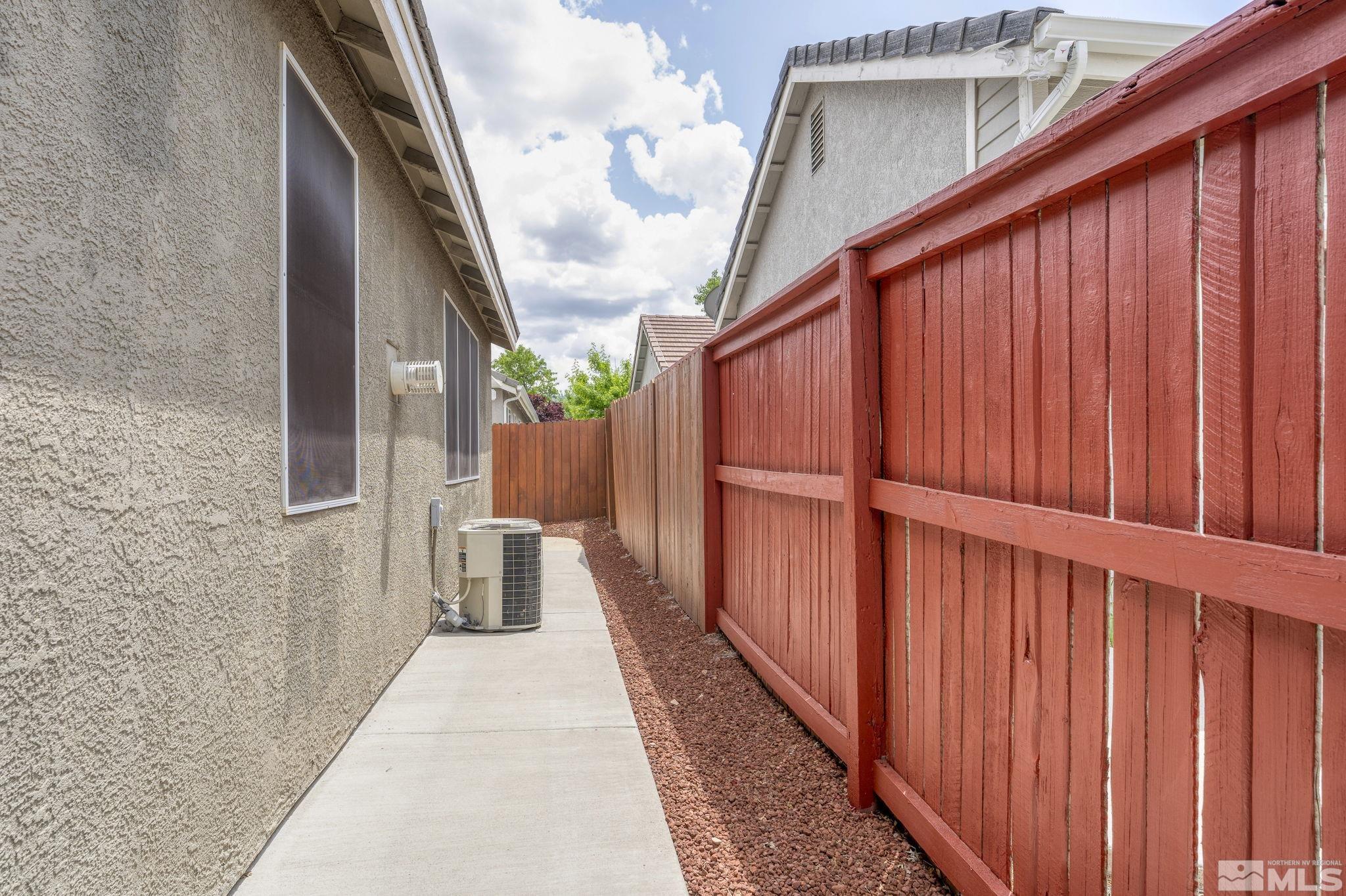 1436 Gaucho Lane Reno, NV 89521 - Photo 33 of 40 a view of a balcony with wooden floor and stairs
