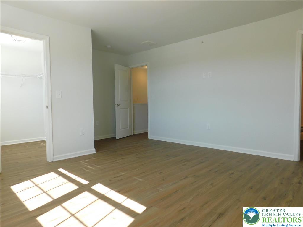6645 Stein Way, Unit 66396661 Lower Macungie Township, PA 18062 - Photo 14 of 20 a view of a hallway