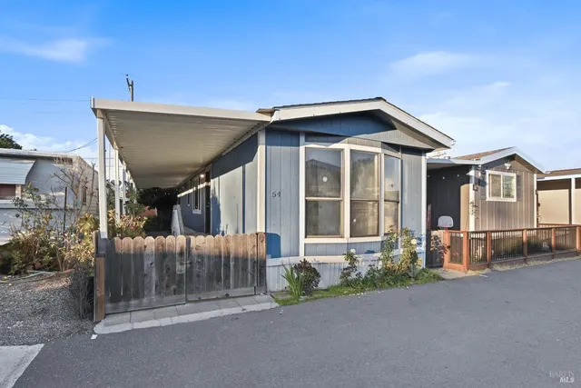 a front view of a house with a porch