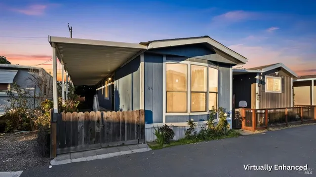 a front view of a house with a garage