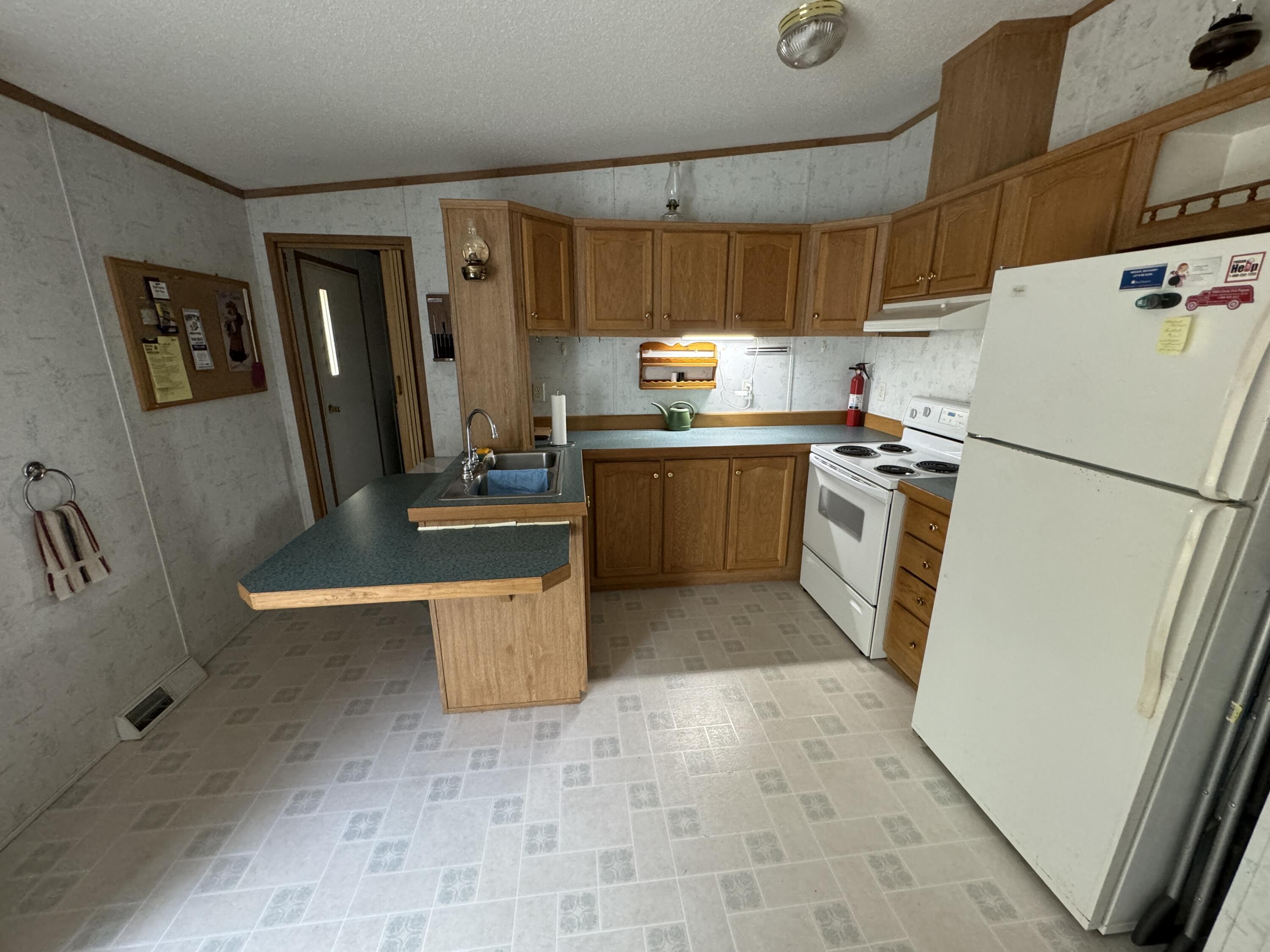 155 Birch Lane Unity, ME 04988 - Photo 9 of 22 Kitchen Entry