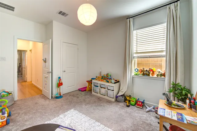 a room with toys and stairs