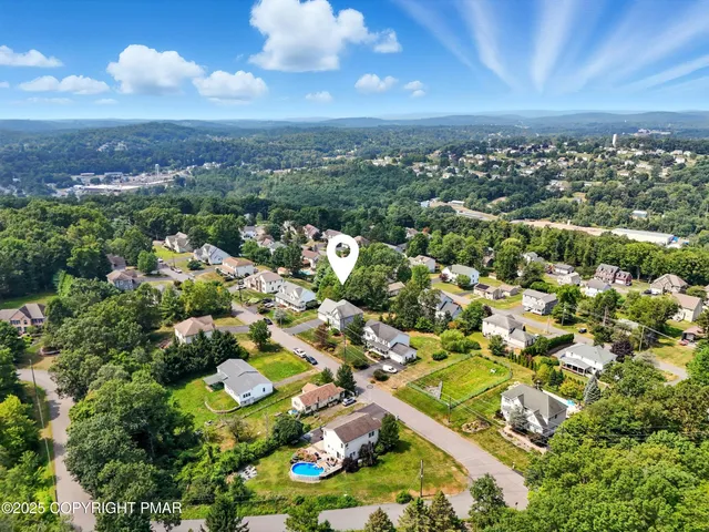 an aerial view of multiple house