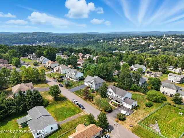 an aerial view of multiple house