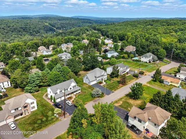 an aerial view of multiple house