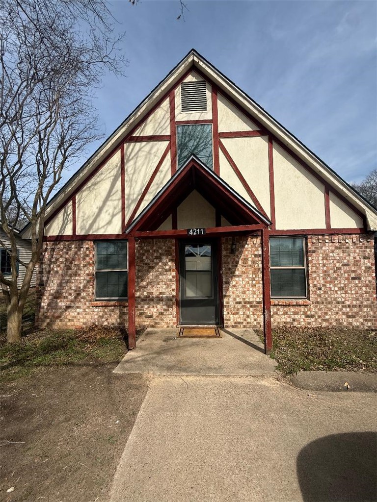 a view of a house with a garage