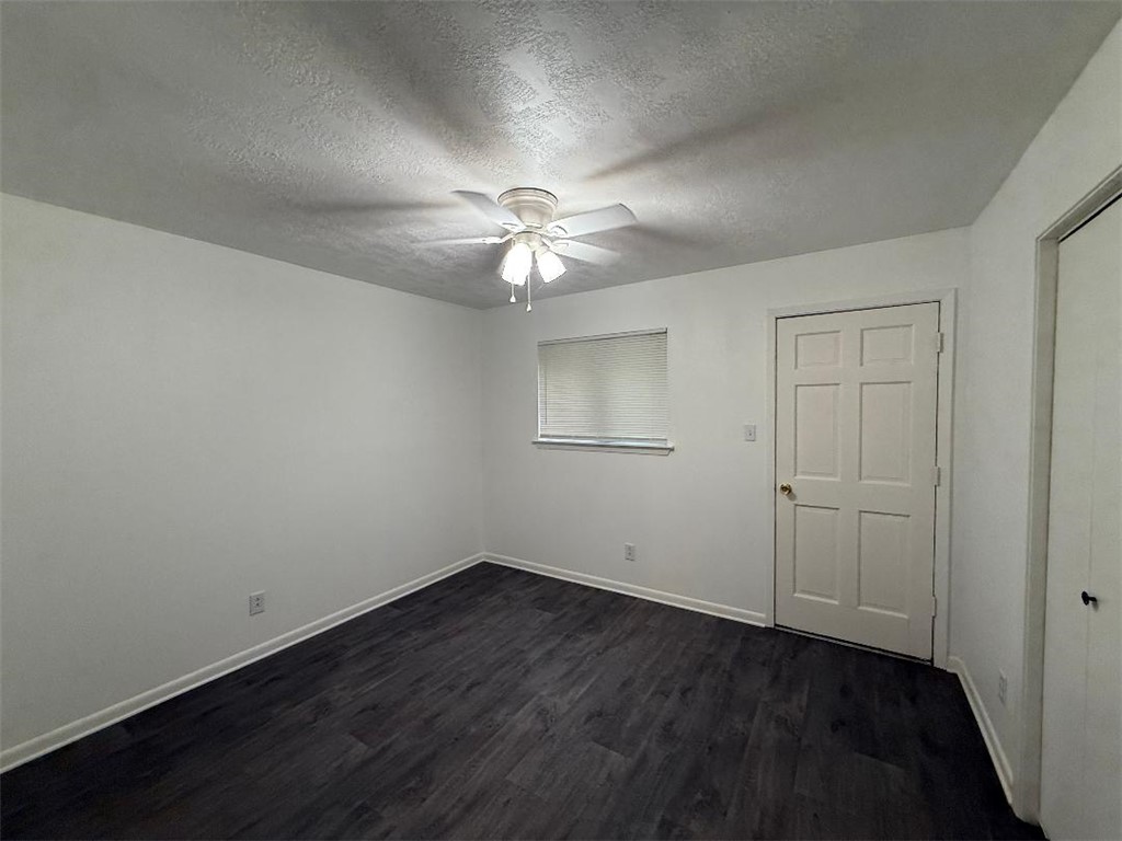 4211 Marsh Street Bryan, TX 77803 - Photo 11 of 13 wooden floor in an empty room
