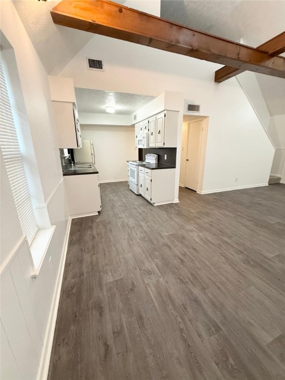 4211 Marsh Street Bryan, TX 77803 - Photo 2 of 13 a view of a kitchen with a sink and cabinets