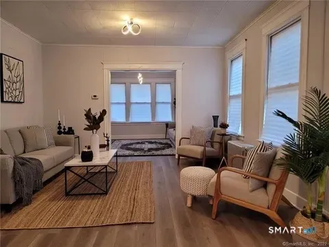 a living room with furniture and a couch
