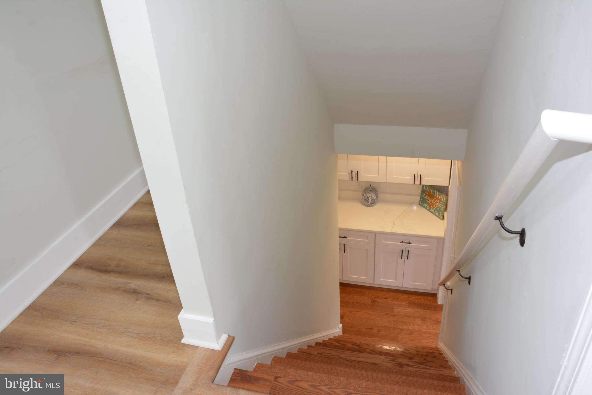 1006 Circle Drive Keymar, MD 21757 - Photo 29 of 57 a view of a hallway view with wooden floor and staircase