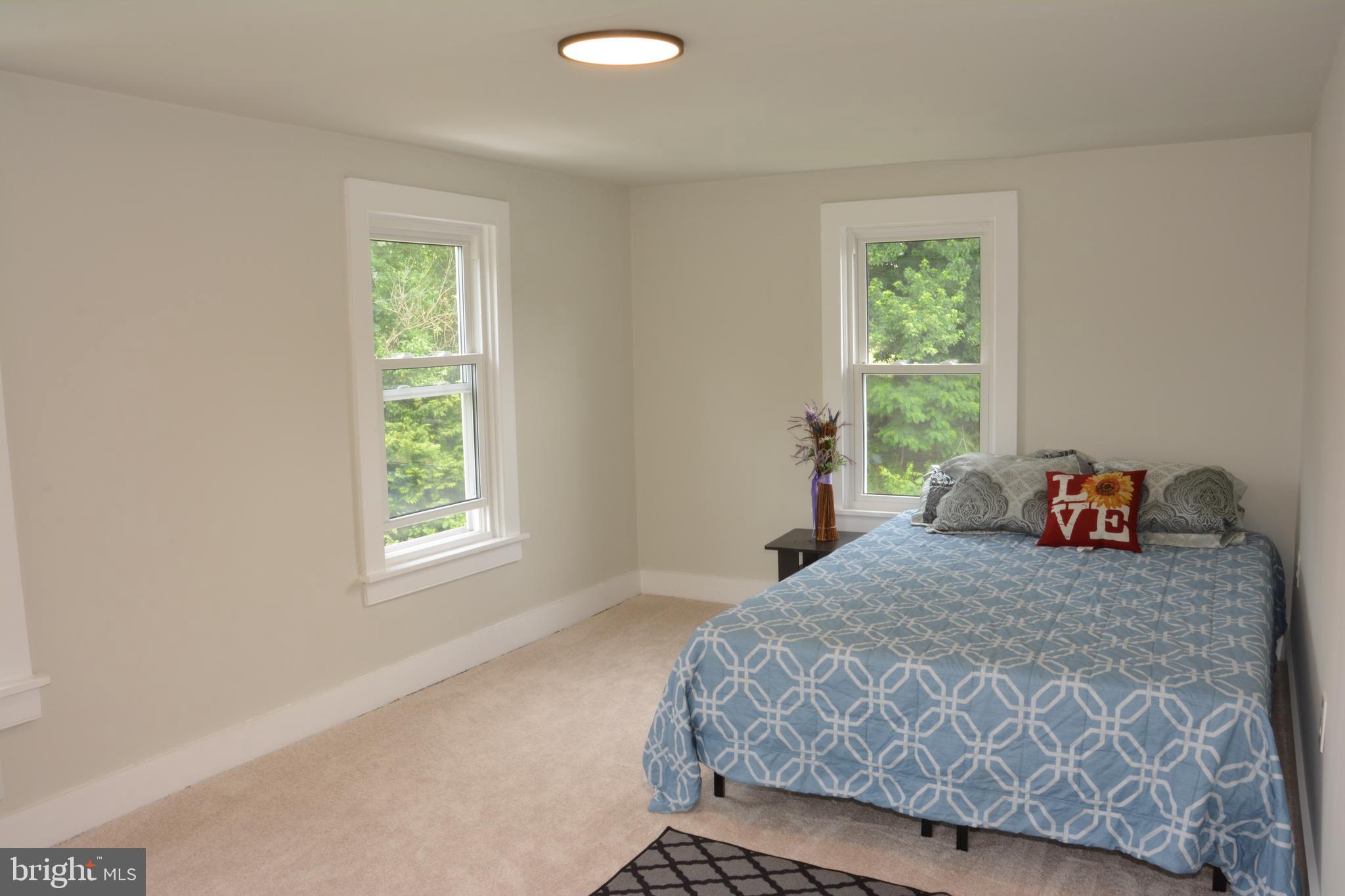 1006 Circle Drive Keymar, MD 21757 - Photo 32 of 57 a bedroom with a bed and a window