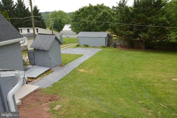 a front view of a house with garage