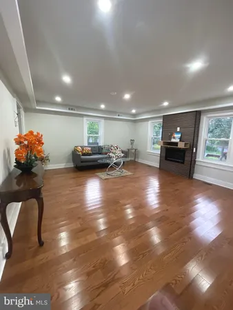 a lobby with furniture and stairs