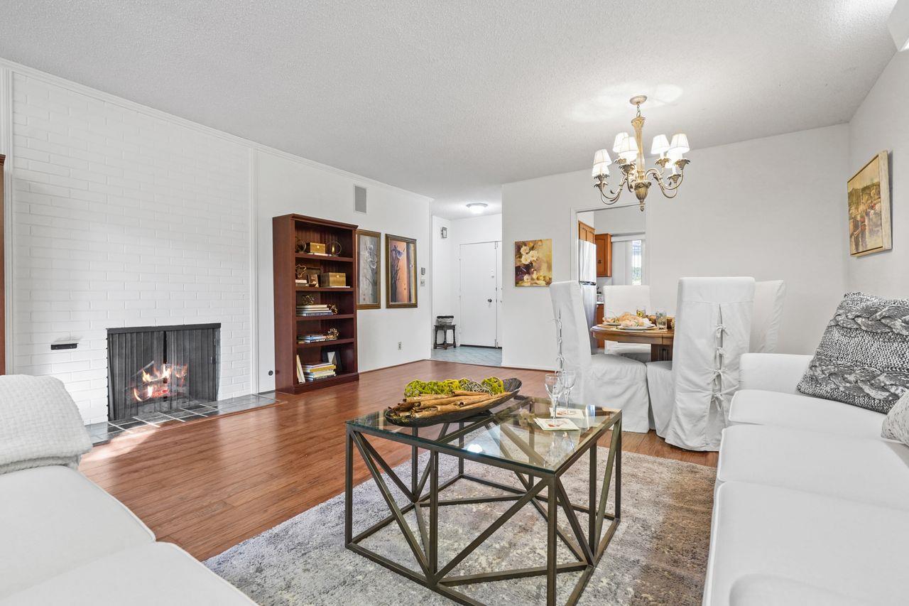 124 Del Mesa Carmel Carmel, CA 93923 - Photo 5 of 28 a living room with furniture and a wooden floor