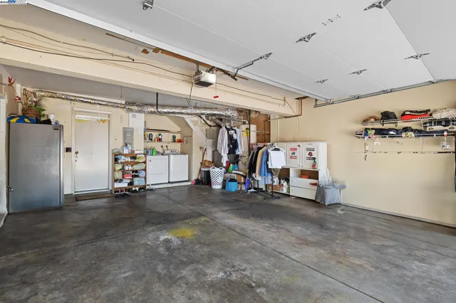 a view of a backyard with sitting area