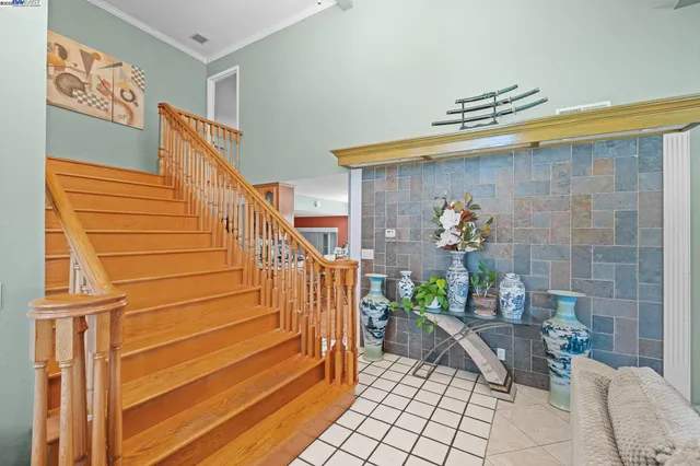 a view of entryway with stairs