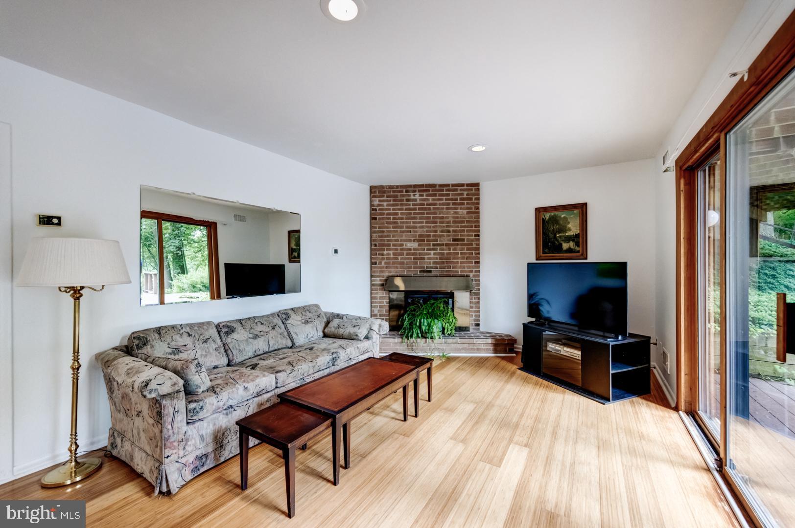 675 Malin Road Newtown Square, PA 19073 - Photo 6 of 44 Brick fireplace with heatilator fan