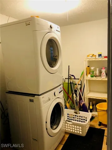 a view of a storage & utility room with washer and dryer