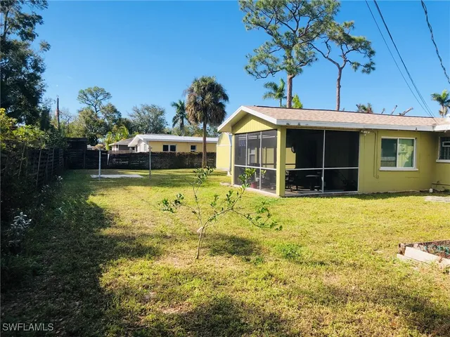 a view of a house with a swimming pool