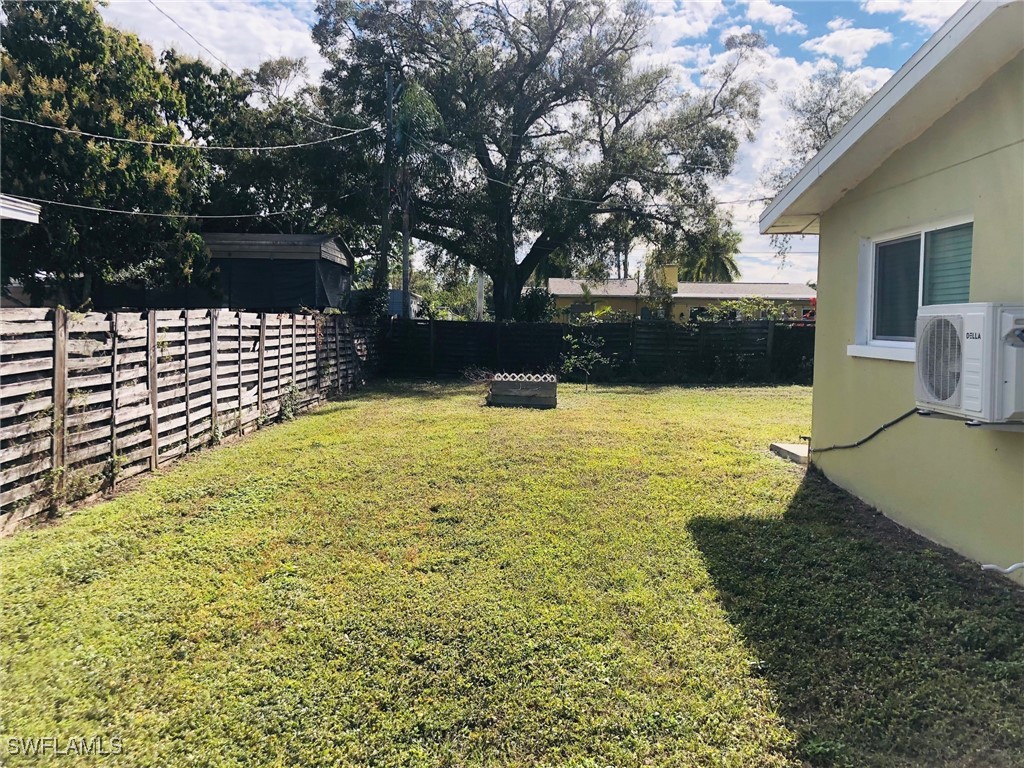 1836 Collier Avenue Fort Myers, FL 33901 - Photo 17 of 19 a view of a swimming pool with an outdoor space