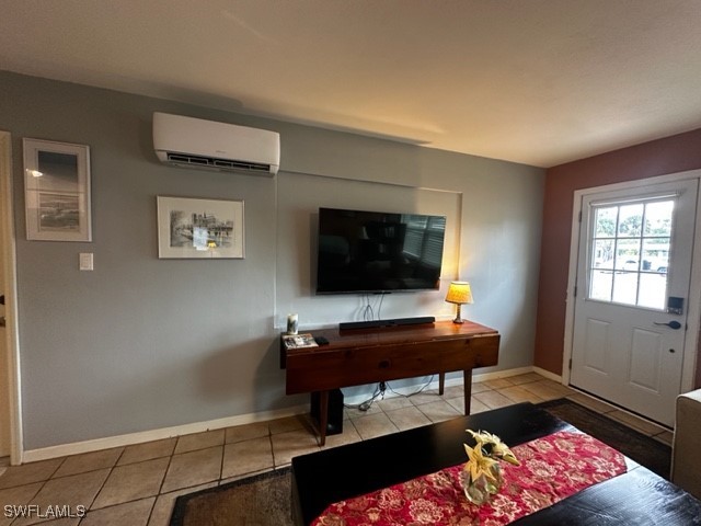 1836 Collier Avenue Fort Myers, FL 33901 - Photo 3 of 19 a living room with furniture and a flat screen tv
