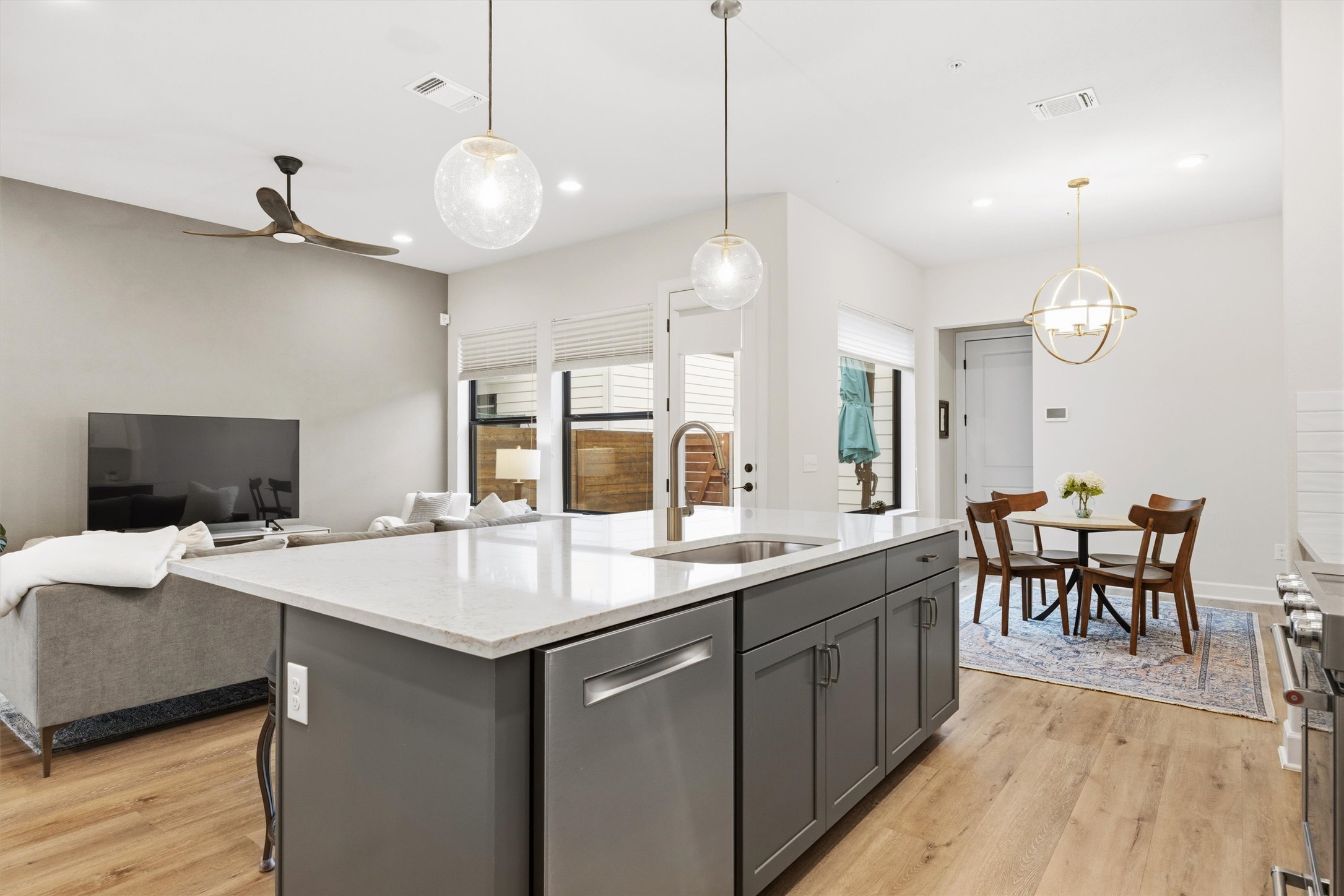 4704 Eberly Street Austin, TX 78723 - Photo 14 of 39 a large kitchen with a table and chairs