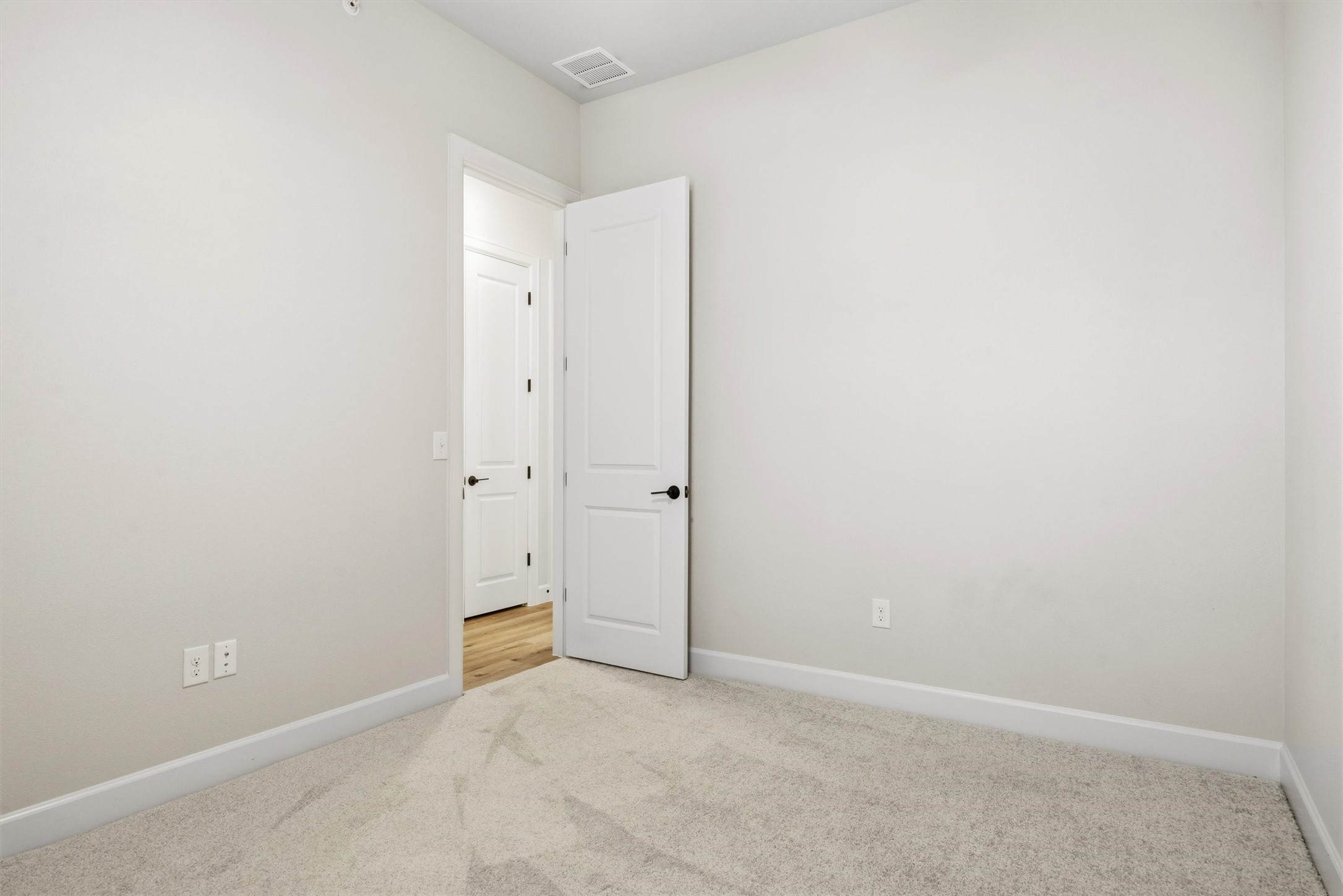 4704 Eberly Street Austin, TX 78723 - Photo 24 of 39 an empty room with an entryway