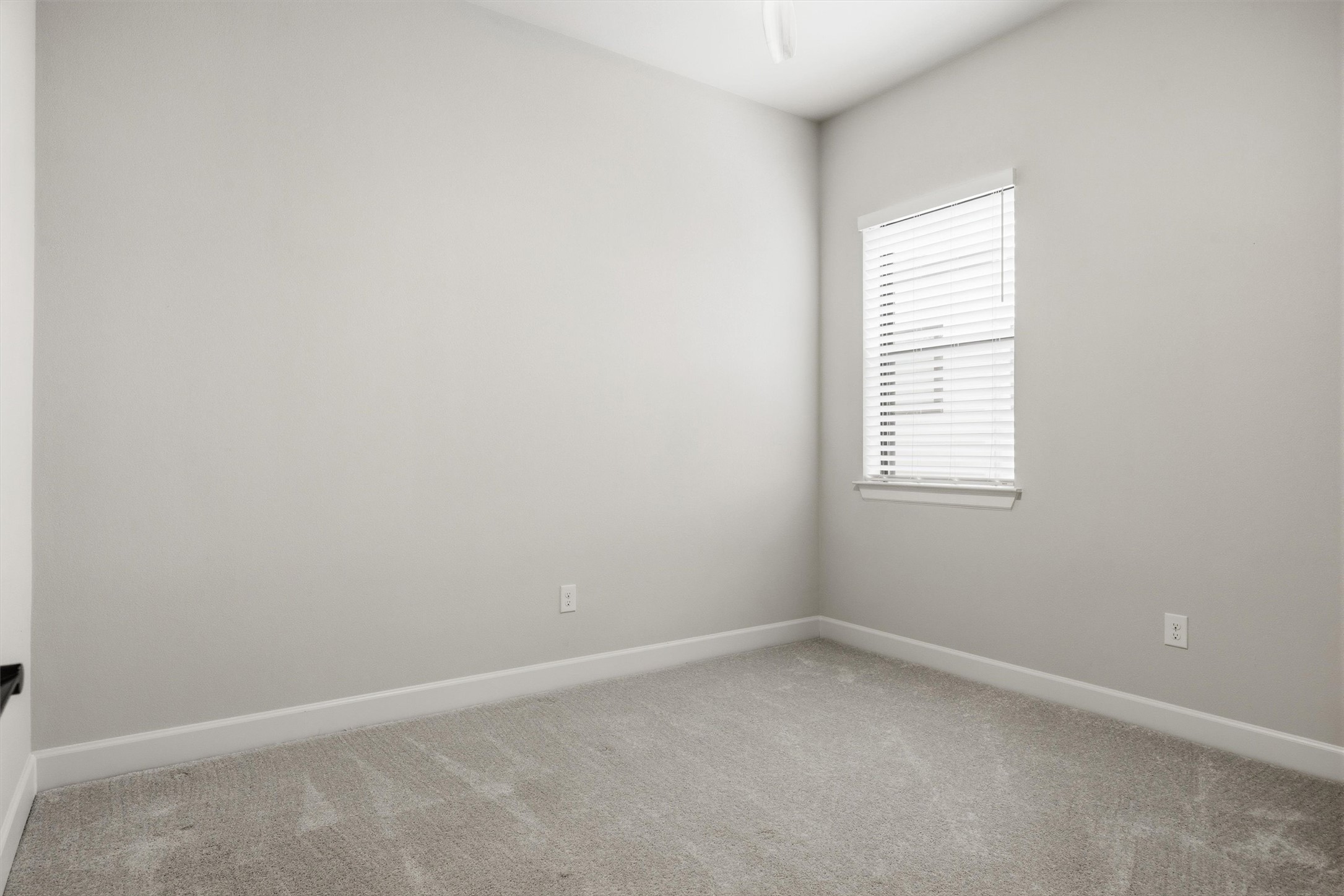 4704 Eberly Street Austin, TX 78723 - Photo 26 of 39 an empty room with a window