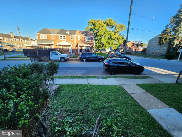 a view of a car in front of a house