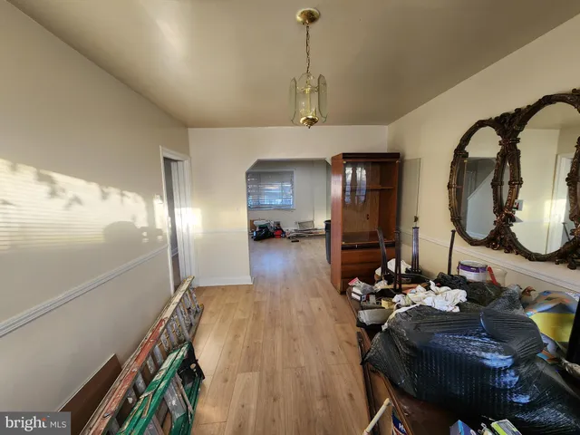 a view of a living room and dining room