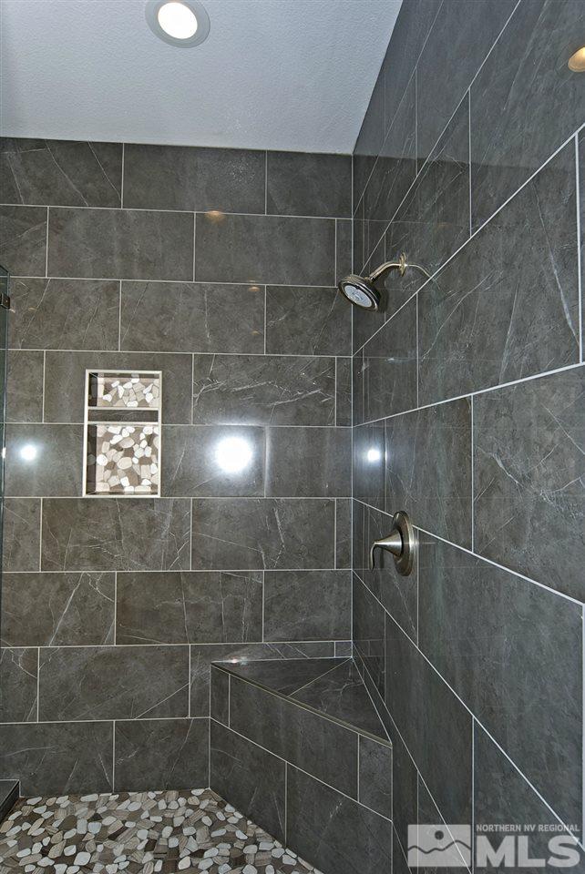 1375 Freds Mountain Road Reno, NV 89508 - Photo 17 of 40 a bathroom with a shower