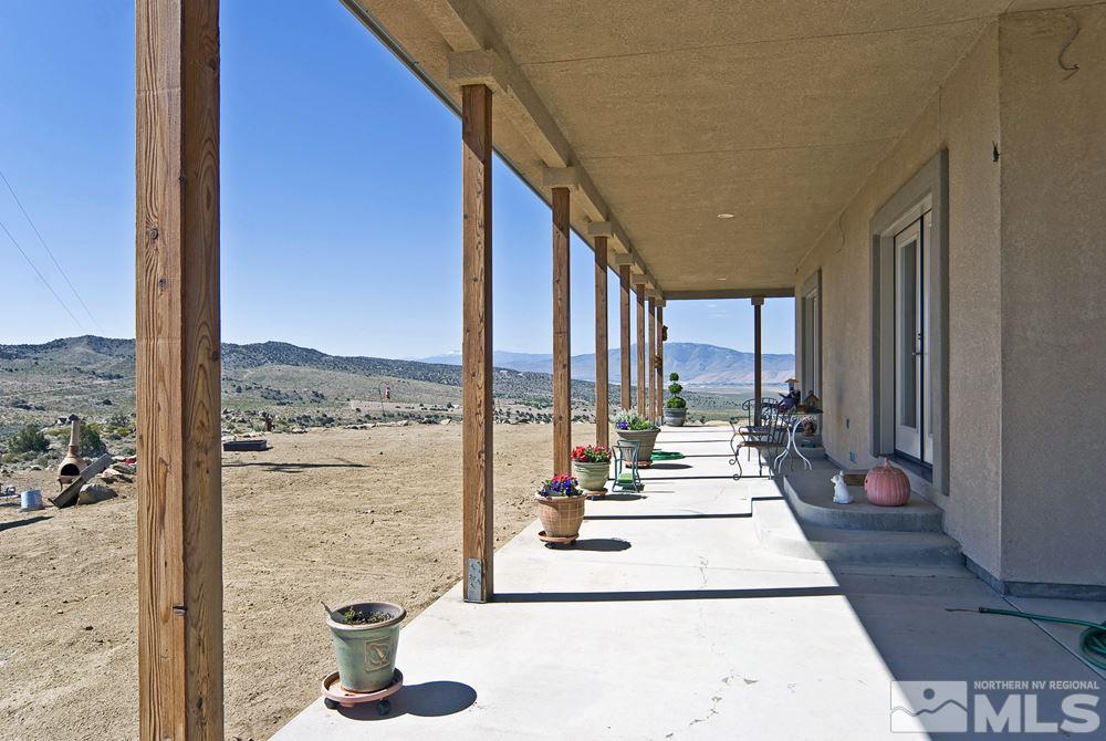 1375 Freds Mountain Road Reno, NV 89508 - Photo 36 of 40 a room with a table and chairs