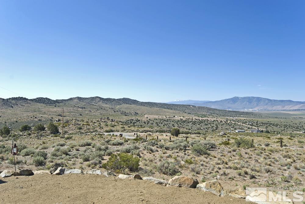 1375 Freds Mountain Road Reno, NV 89508 - Photo 38 of 40 a view of a city with mountain in the background