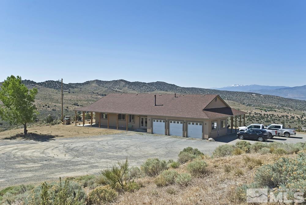 1375 Freds Mountain Road Reno, NV 89508 - Photo 40 of 40 a view of houses with a road