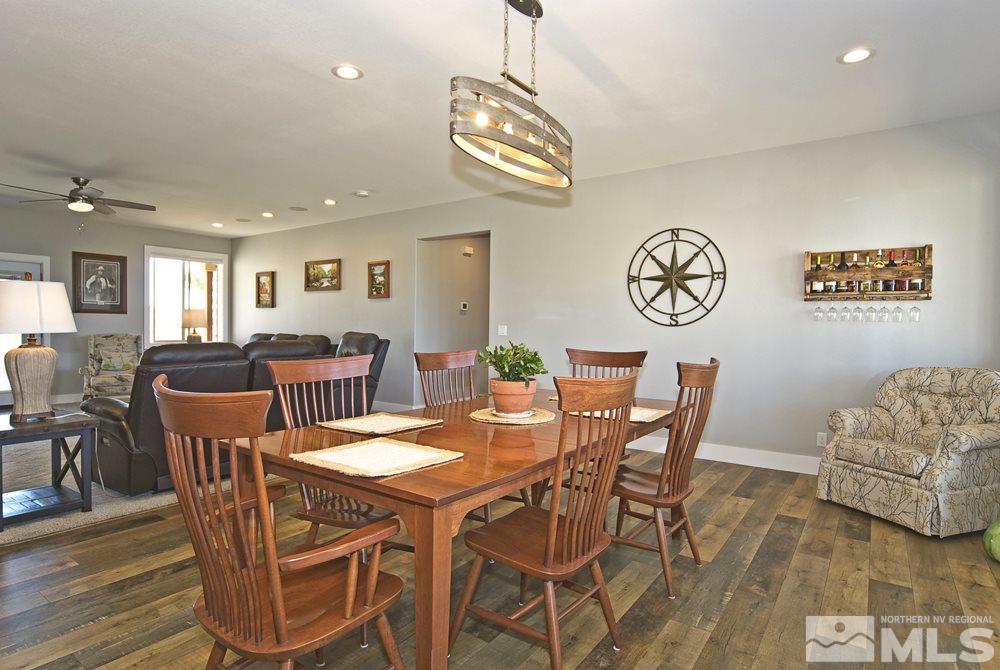 1375 Freds Mountain Road Reno, NV 89508 - Photo 6 of 40 a view of a dining room with furniture and chandelier