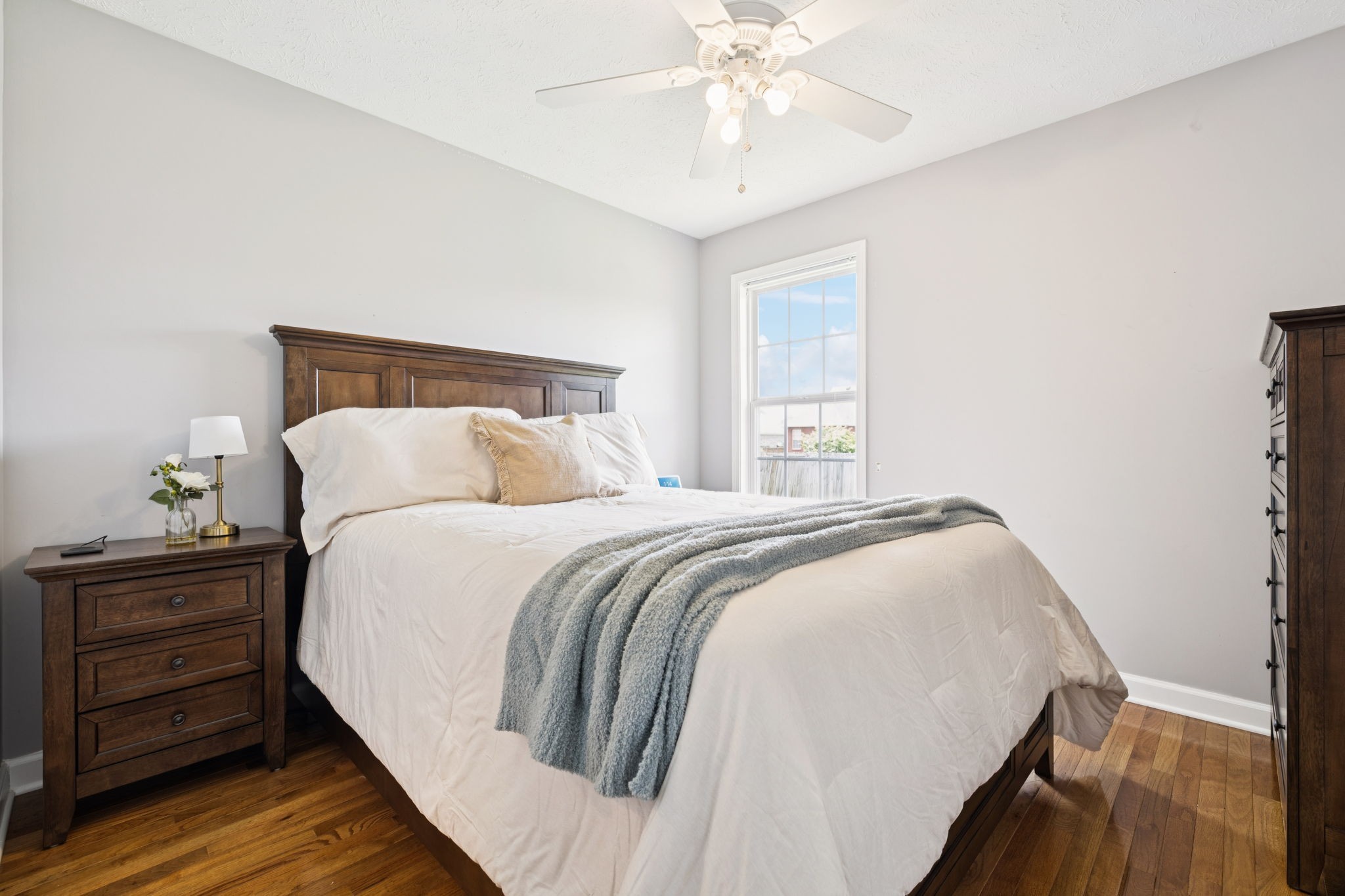 526 Stetson Court Murfreesboro, TN 37128 - Photo 12 of 26 a bedroom with a bed and cabinet