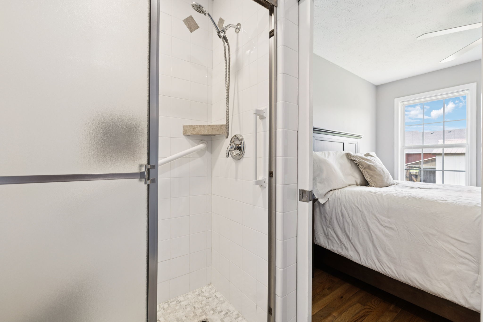 526 Stetson Court Murfreesboro, TN 37128 - Photo 15 of 26 a bedroom with a bed and a refrigerator