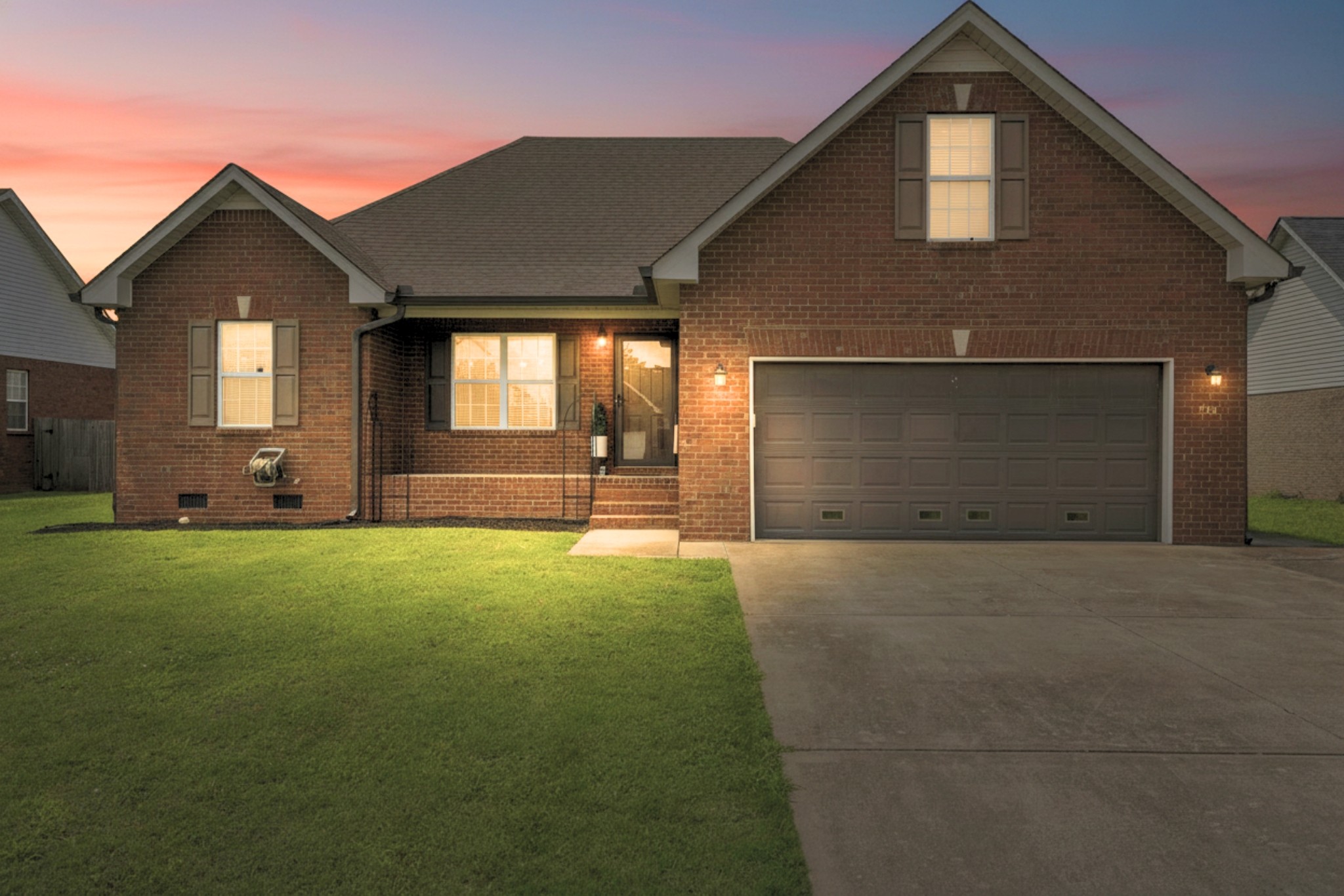 526 Stetson Court Murfreesboro, TN 37128 - Photo 2 of 26 a front view of a house with garden