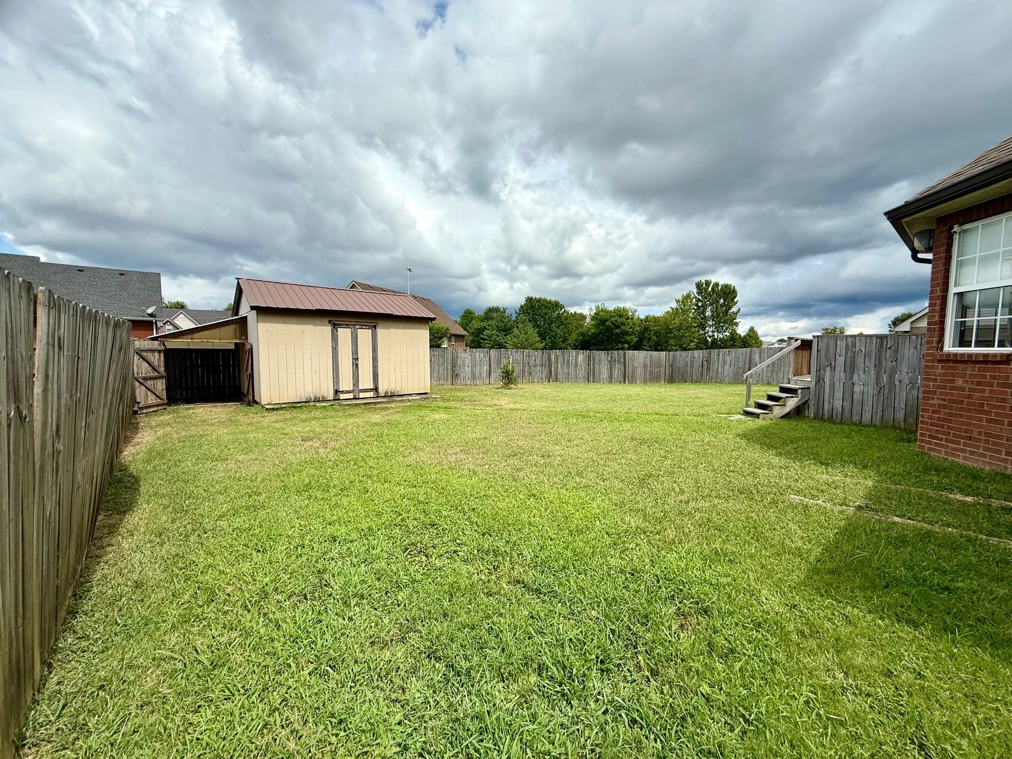 526 Stetson Court Murfreesboro, TN 37128 - Photo 23 of 26 a view of a house with a backyard