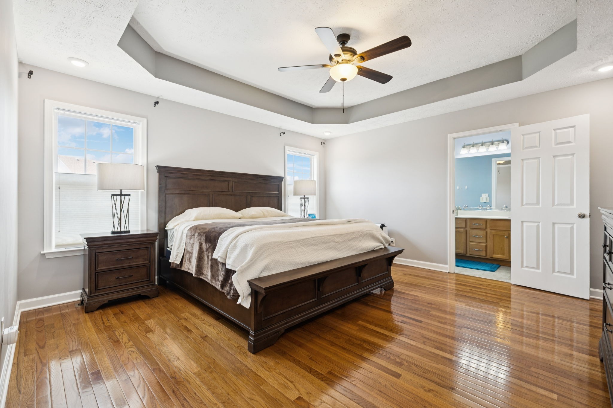 526 Stetson Court Murfreesboro, TN 37128 - Photo 8 of 26 a bed room with a bed and a chandelier