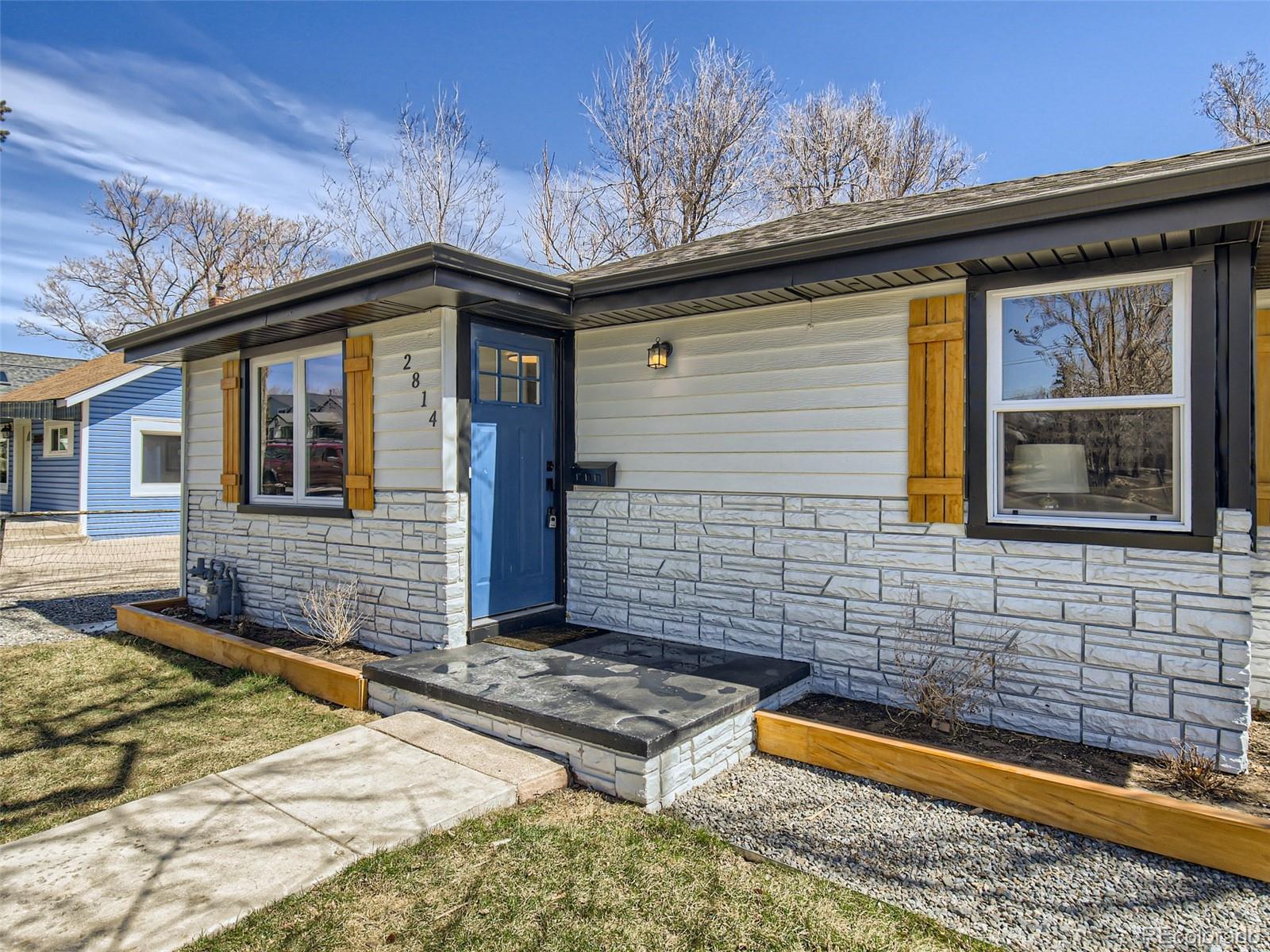 2814 Chase Street Wheat Ridge, CO 80214 - Photo 3 of 28 a front view of a house with windows