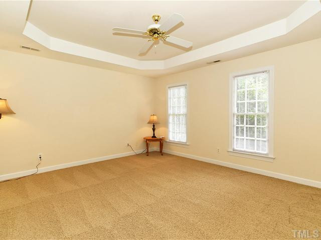 4820 Salem Ridge Road Holly Springs, NC 27540 - Photo 9 of 12 Spacious master suite with trey ceiling, fresh paint and new carpet Master Bedroom