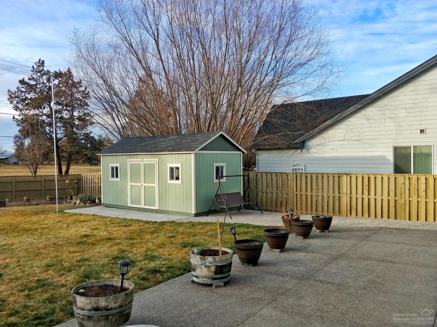 2903 Southwest 50th Street Redmond, OR 97756 - Photo 19 of 24 Concrete patio poured in the last couple