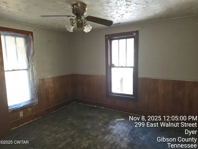 a view of an empty room and window