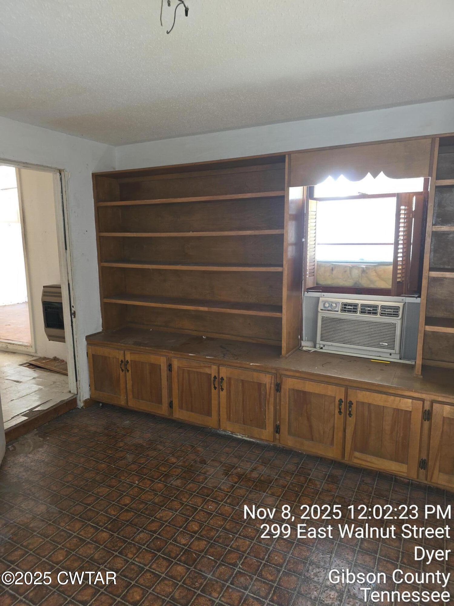 299 East Walnut Street Dyer, TN 38330 - Photo 31 of 41 a view of a closet area with wooden floor