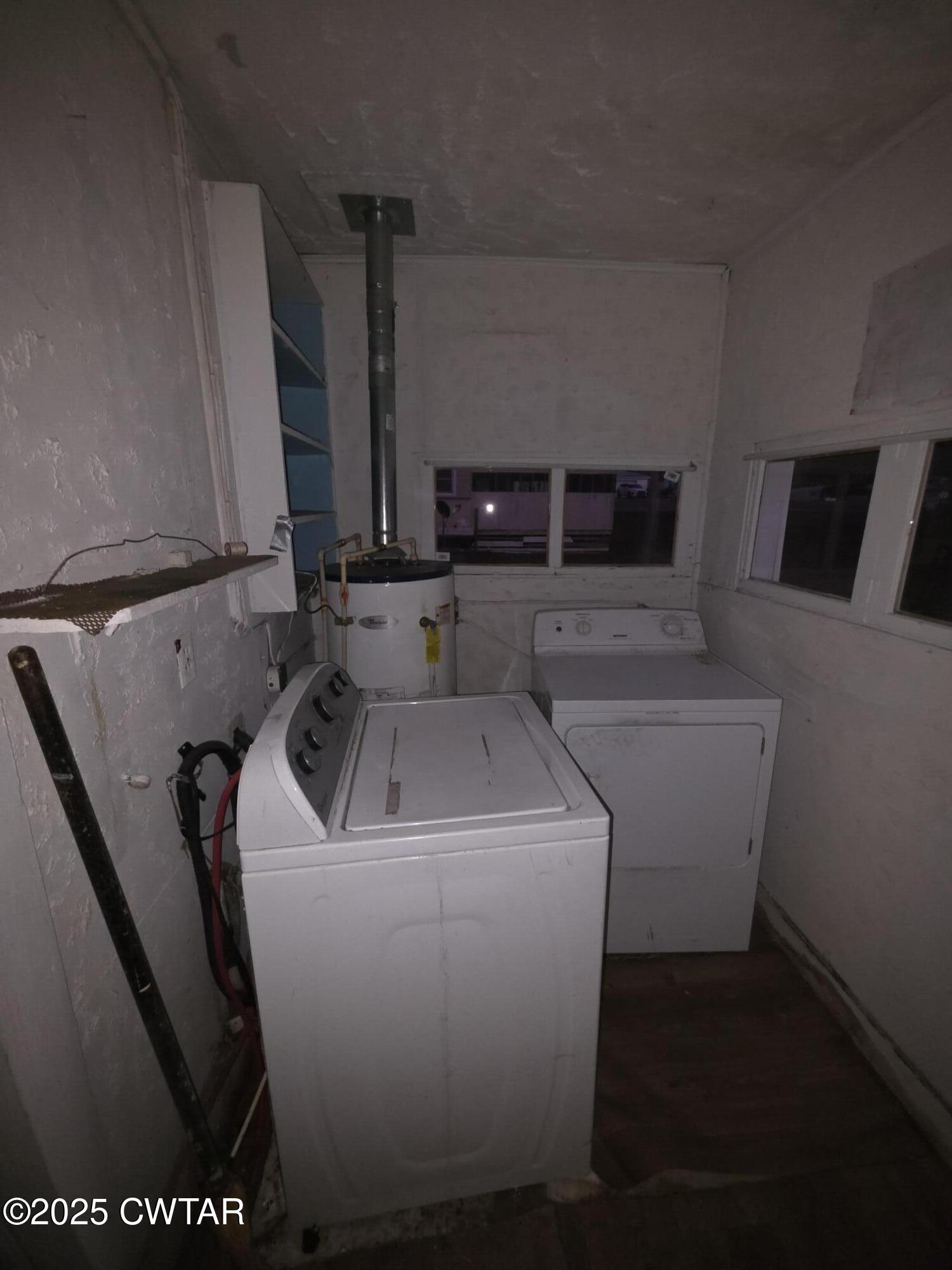 299 East Walnut Street Dyer, TN 38330 - Photo 37 of 41 a utility room with dryer and washer