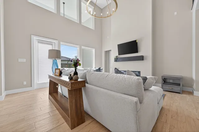 a bedroom with a bed and a table in it