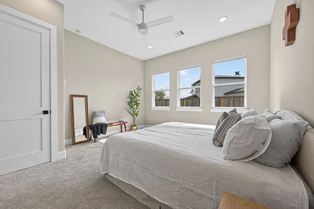 a view of a house with garden and pathway